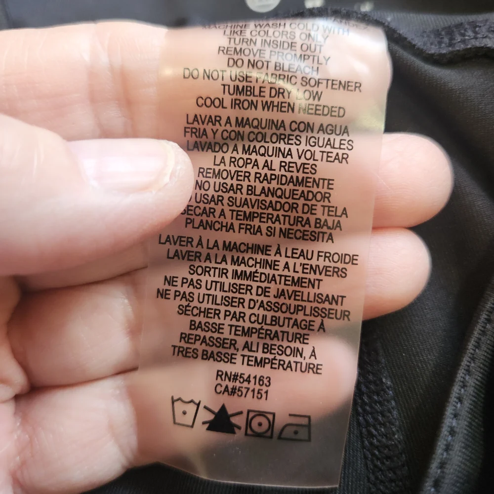 Calvin Klein 20" Cropped Black Leggings with Iridescent "CALVIN" Logo - Picture 4 of 8